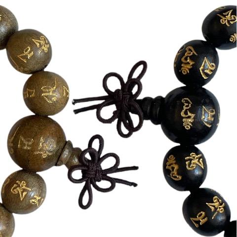 Product Image and Link for Compassion Buddha Mantra Mala Bracelet