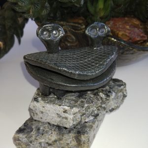 Product Image and Link for Black Creature on the Rocks | Ceramic and Rock Tabletop Sculpture