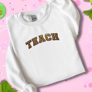 Product Image and Link for Embroidered Teach Shirt with Gold Glitter Canvas and Satin Stitch Border