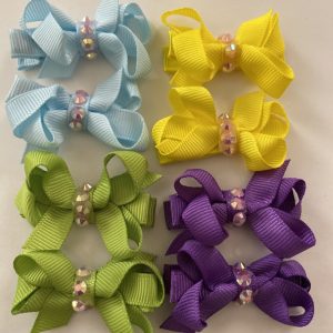 Product Image and Link for 8- Piece My L’il Darlin’ 11/2′ Assorted Colored Bows, W/ Pearlescent Center