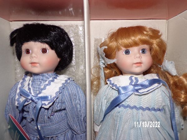 Product Image and Link for TWO MARIAN YU DESIGNS PORCELAIN GIRL AND BOY DOLLS 14″ Vintage MYD Inc