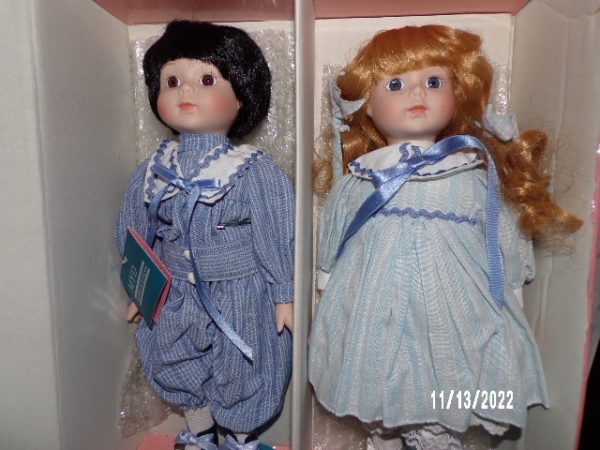 Product Image and Link for TWO MARIAN YU DESIGNS PORCELAIN GIRL AND BOY DOLLS 14″ Vintage MYD Inc