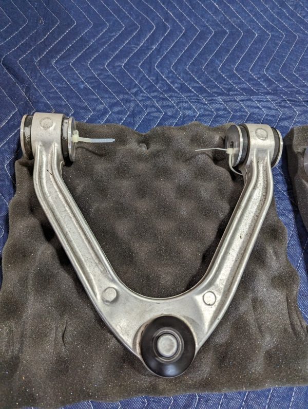 Product Image and Link for 2010 Nissan GT-R R35 Front Upper Suspension Control Arm Pair