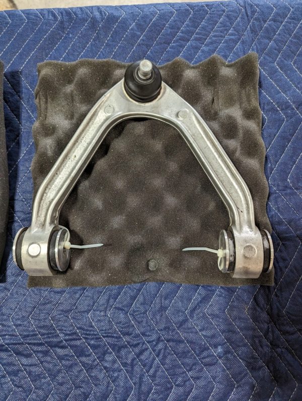 Product Image and Link for 2010 Nissan GT-R R35 Front Upper Suspension Control Arm Pair
