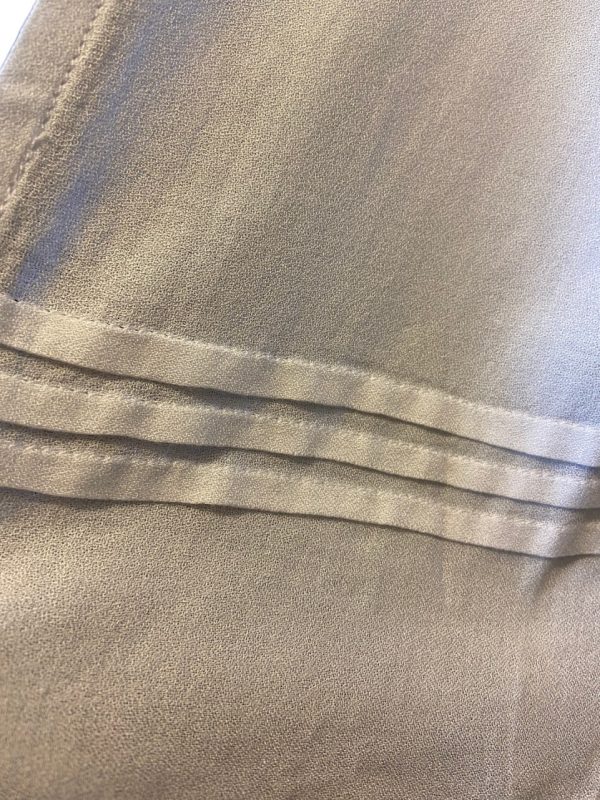 Product Image and Link for Sleeveless Round Neck Shirt with Side Slits