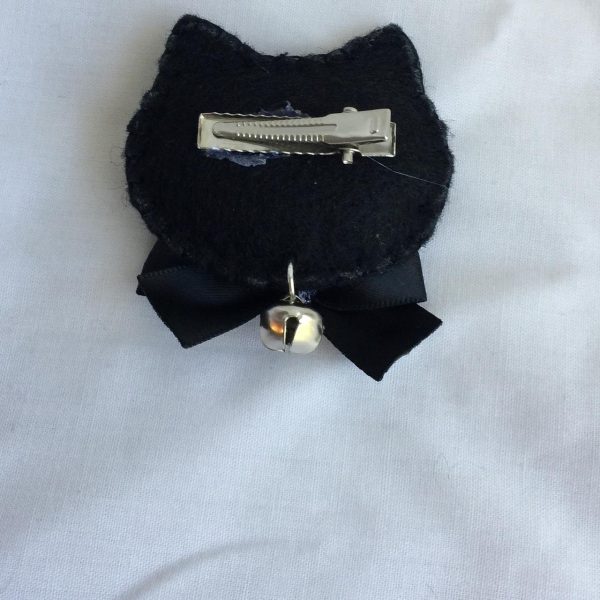 Product Image and Link for Pair of Black Kitty Cat Hairclips with a Bow and Bell