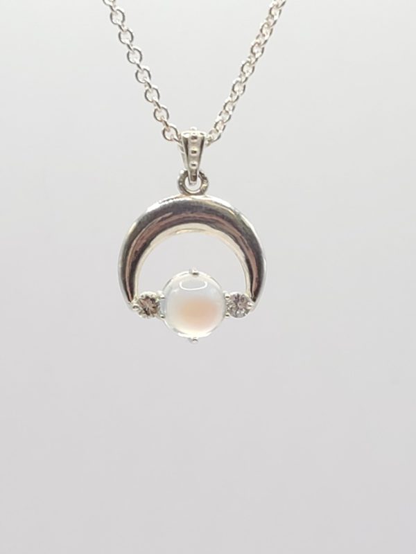 Product Image and Link for Crescent Moon Necklace in silver with round moonstone