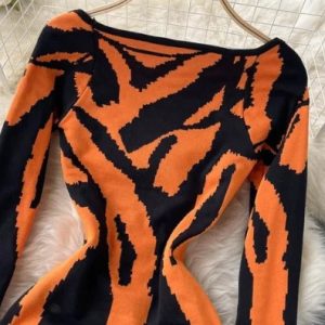 Product Image and Link for Swivel Me Orange/Black Midi dress