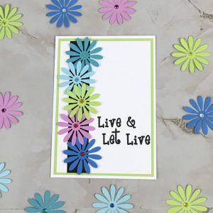 Product Image and Link for Daisy Slogan Greeting Card Live and Let Live