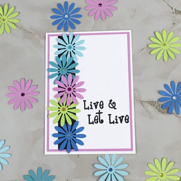 Product Image and Link for Daisy Slogan Greeting Card Live and Let Live