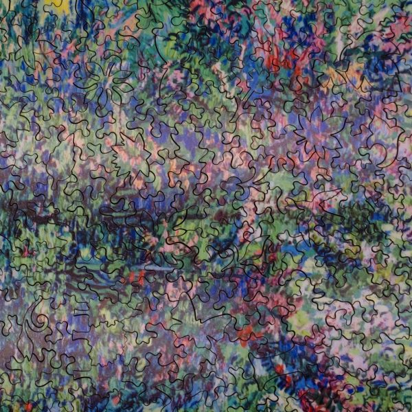 Product Image and Link for The Garden Of The Asylum At Saint-Remy By Vincent Van Gogh (549 Piece Wooden Jigsaw Puzzle)