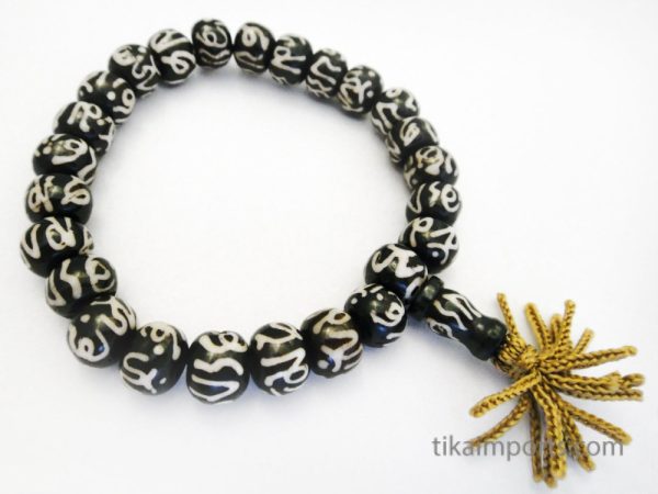 Product Image and Link for Carved Bone Batik Om Mala Bracelet