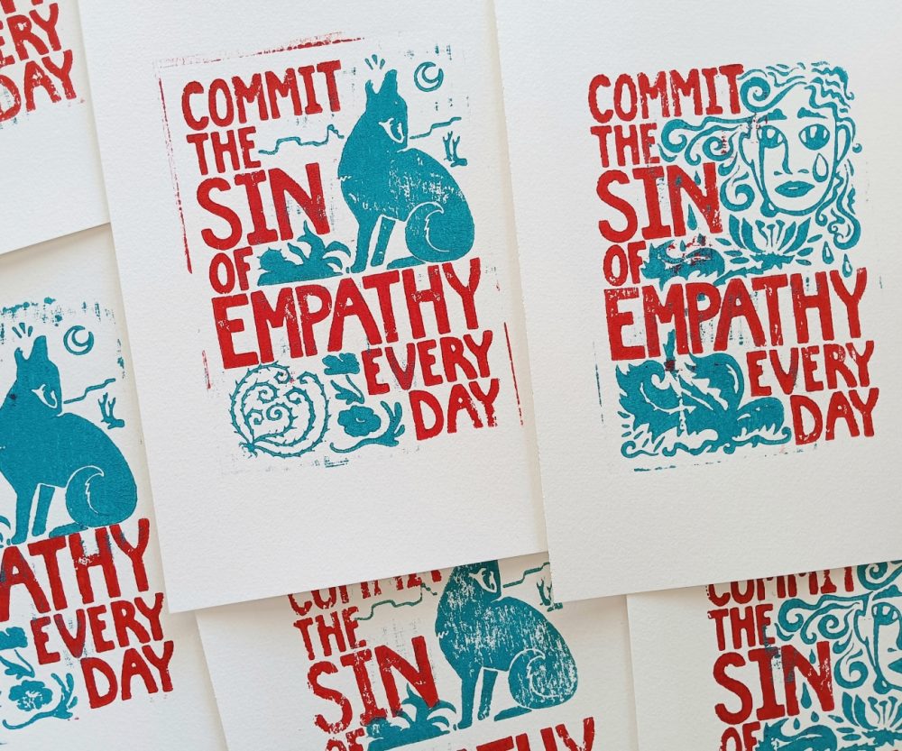 Product Image and Link for “Commit the Sin of Empathy Every Day” Woodblock Print (2 Designs)