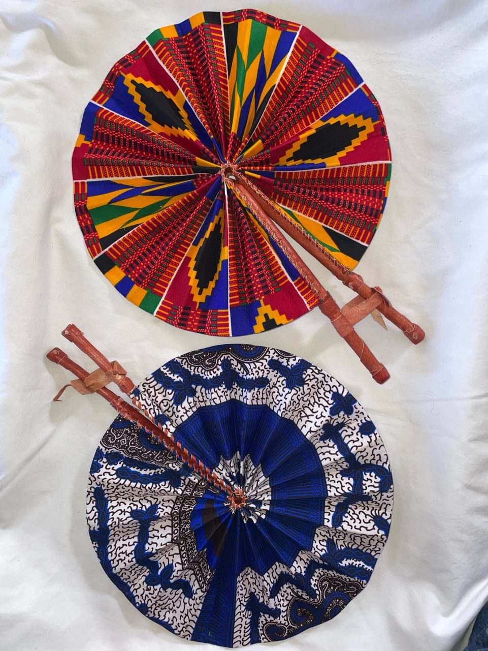 DESIGNS C1 OR C2: Bright African Kente folding fans w/ Leather Handles