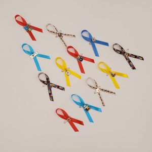 Product Image and Link for Autism Awareness Ribbon Pins – 25 Pack